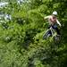 Ann Arbor resident Nate Gentile does dirt jumps with his bike while Brighton resident Adam Carlson gets ready to ride on Sunday, May 26. Daniel Brenner I AnnArbor.com